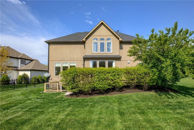 9500 N Lane Ave, Kansas City, MO 64157 - back of property with a lawn and fence