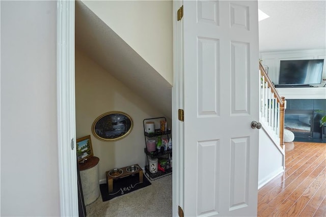 interior space featuring stairway and wood finished floors