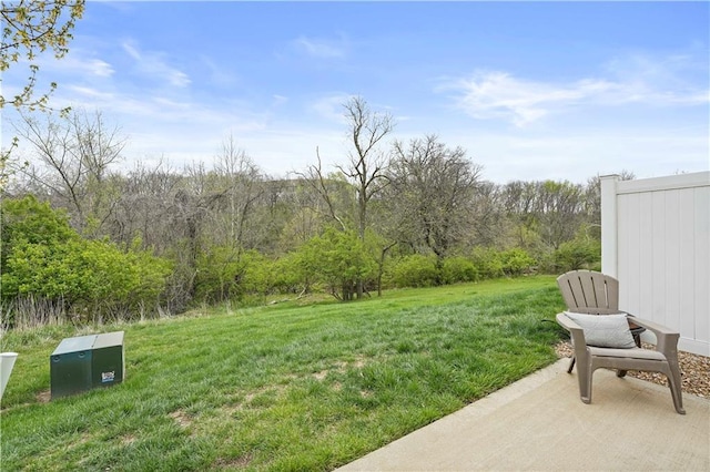 view of yard with a wooded view
