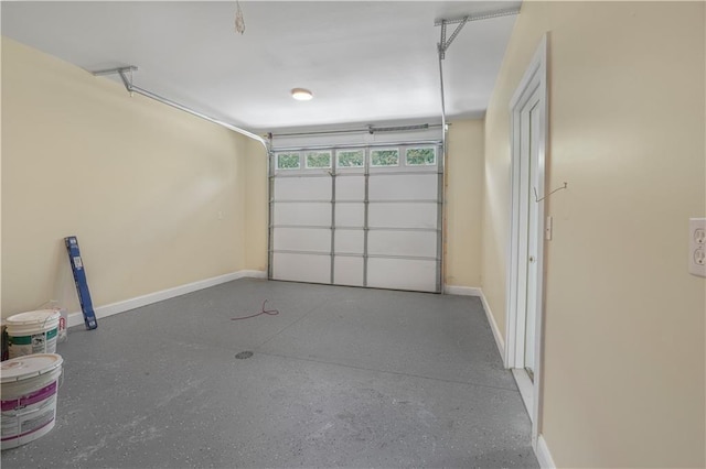 garage featuring baseboards