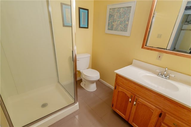 603 N 5th St, Atchison, KS 66002 - full bathroom with toilet, vanity, a shower stall, and tile patterned flooring