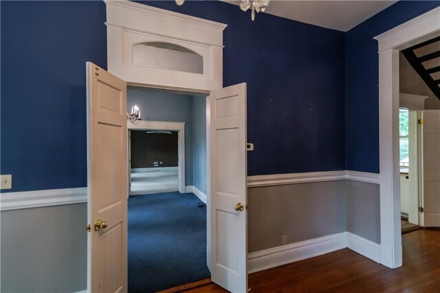 603 N 5th St, Atchison, KS 66002 - corridor with baseboards and wood finished floors