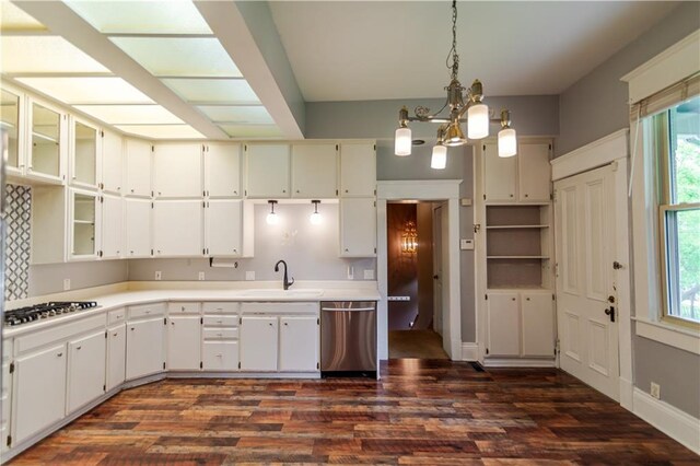 603 N 5th St, Atchison, KS 66002 - kitchen featuring stainless steel appliances, a sink, a chandelier, and dark wood-type flooring
