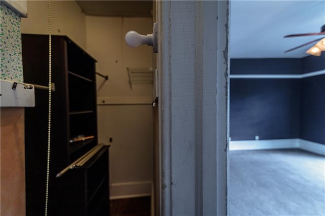 603 N 5th St, Atchison, KS 66002 - spacious closet with ceiling fan and carpet flooring