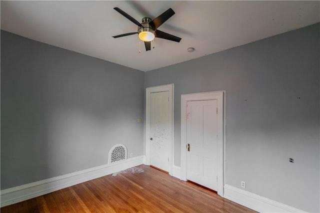 603 N 5th St, Atchison, KS 66002 - spare room with baseboards, ceiling fan, and wood finished floors
