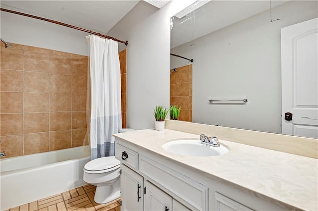 bathroom with vanity, shower / bathtub combination with curtain, and toilet