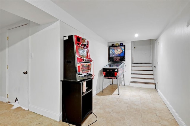 hallway with light tile patterned floors, baseboards, stairway, and recessed lighting