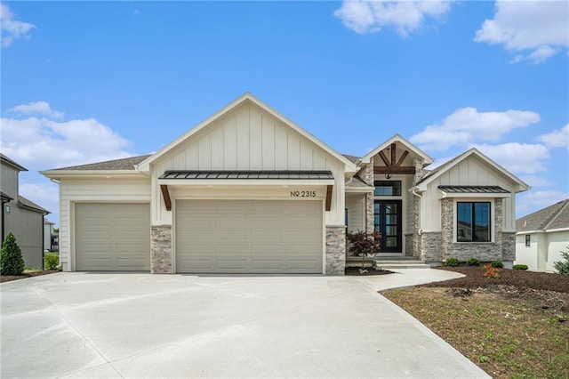 2315 SW Serena Pl, Lees Summit, MO 64082 - craftsman inspired home featuring a garage, board and batten siding, driveway, and stone siding