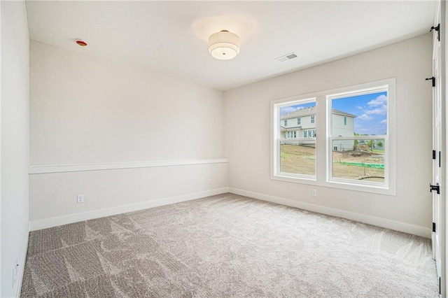 2315 SW Serena Pl, Lees Summit, MO 64082 - carpeted spare room with baseboards