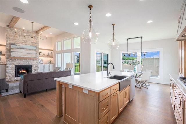 2315 SW Serena Pl, Lees Summit, MO 64082 - kitchen featuring dark wood finished floors, beam ceiling, dishwasher, recessed lighting, and light countertops