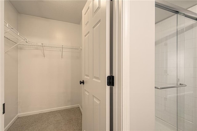 5600 NE 80th Ter Unit 3D, Kansas City, MO 64119 - spacious closet featuring carpet floors