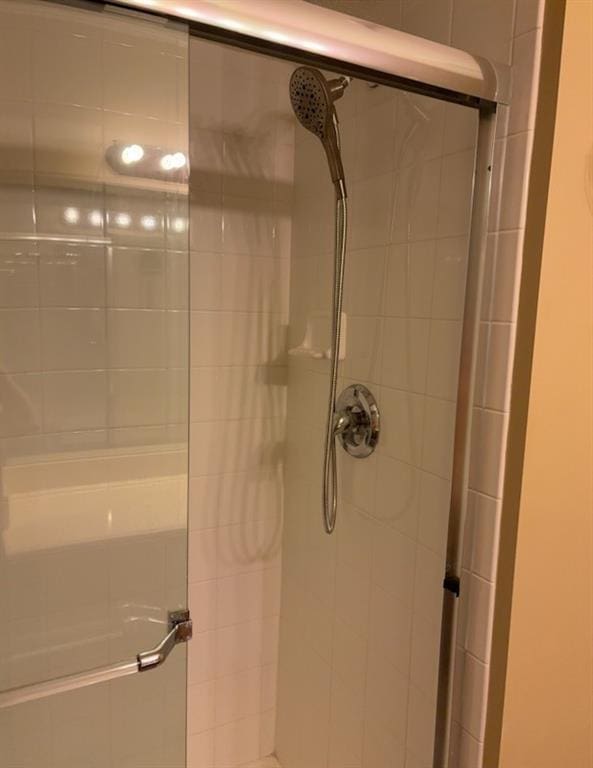 interior details with a shower stall
