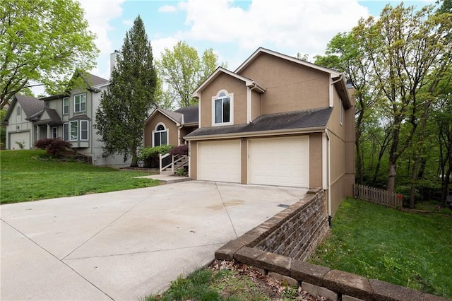 view of front of property with fence, an attached garage, stucco siding, a front yard, and driveway