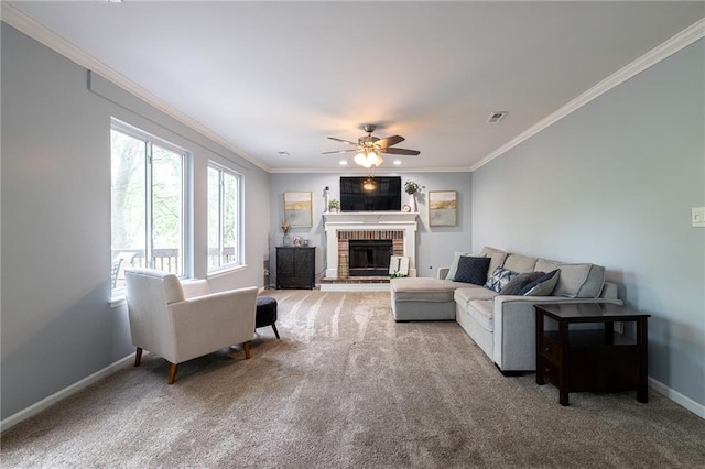 living area with carpet floors, ceiling fan, visible vents, and ornamental molding