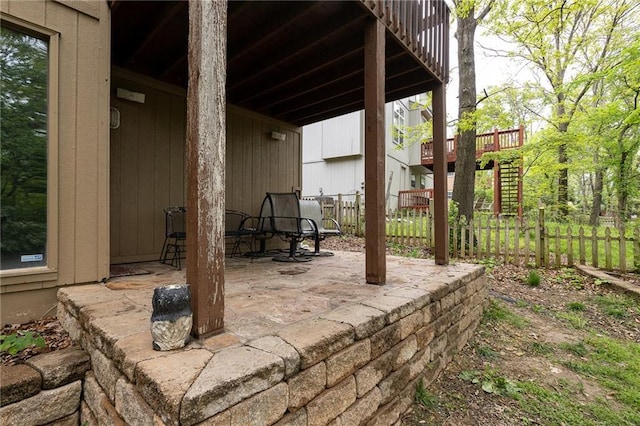 view of patio with fence