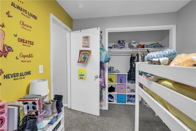 carpeted bedroom featuring a closet
