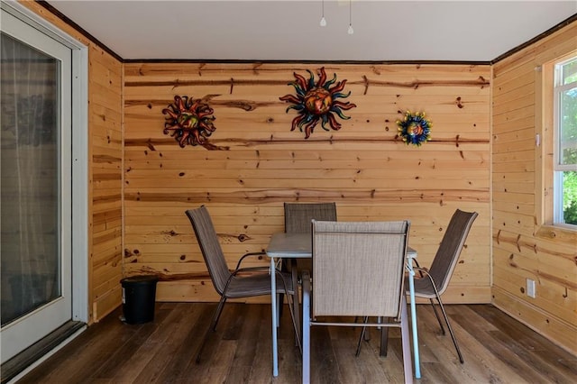 101 W Minor Dr, Kansas City, MO 64114 - dining room with wooden walls and dark wood-type flooring