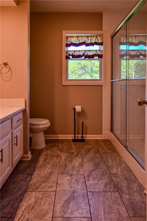 101 W Minor Dr, Kansas City, MO 64114 - full bath featuring toilet, vanity, and a stall shower