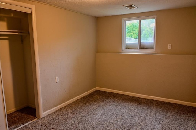 101 W Minor Dr, Kansas City, MO 64114 - unfurnished bedroom featuring carpet and baseboards