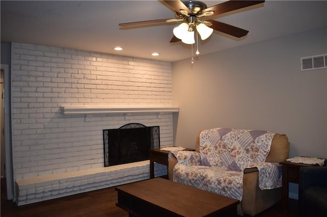 101 W Minor Dr, Kansas City, MO 64114 - living area with a ceiling fan, a fireplace, wood finished floors, and recessed lighting