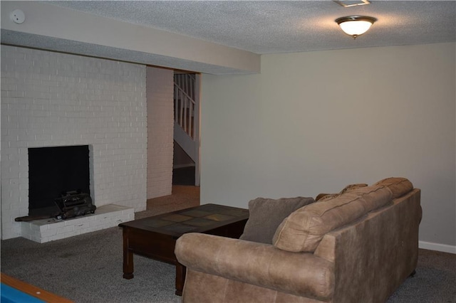 101 W Minor Dr, Kansas City, MO 64114 - living area featuring carpet flooring, stairs, and a textured ceiling