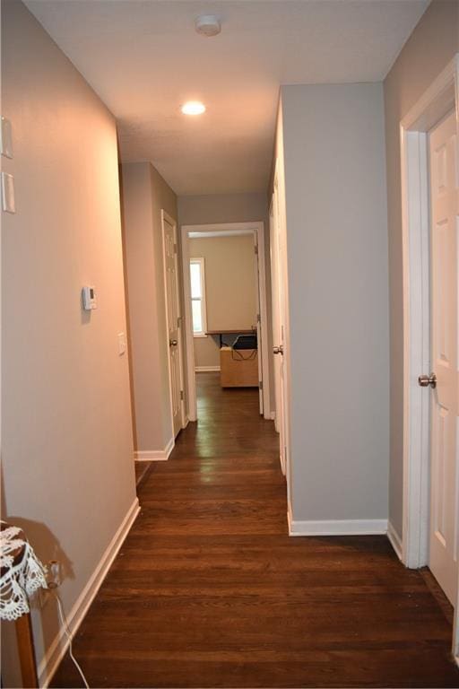 101 W Minor Dr, Kansas City, MO 64114 - corridor with baseboards, dark wood-type flooring, and recessed lighting