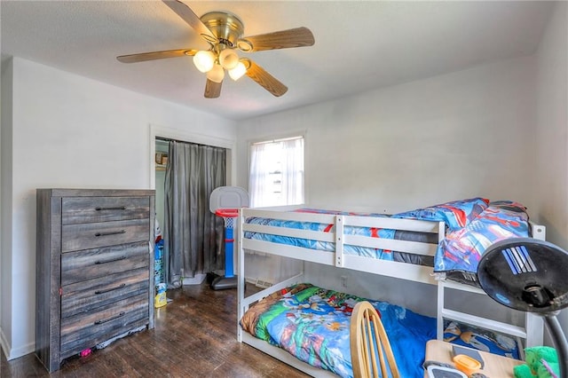 6606 E 135th St, Grandview, MO 64030 - bedroom with wood finished floors and a ceiling fan