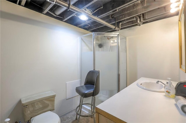 6606 E 135th St, Grandview, MO 64030 - bathroom featuring a shower stall, toilet, and vanity