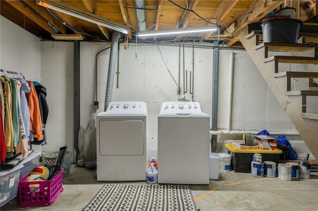laundry area with separate washer and dryer and laundry area