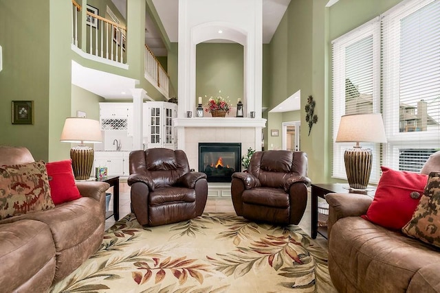5720 NE Quartz Dr, Lees Summit, MO 64064 - living room with a fireplace and a towering ceiling