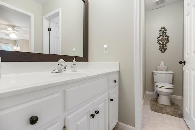 5720 NE Quartz Dr, Lees Summit, MO 64064 - bathroom featuring a ceiling fan, visible vents, tile patterned flooring, vanity, and toilet