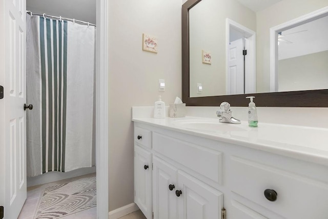5720 NE Quartz Dr, Lees Summit, MO 64064 - bathroom with tile patterned floors and vanity