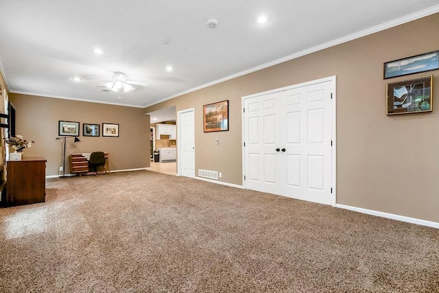 5720 NE Quartz Dr, Lees Summit, MO 64064 - interior space featuring a ceiling fan, visible vents, crown molding, baseboards, and carpet floors
