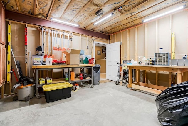 5720 NE Quartz Dr, Lees Summit, MO 64064 - unfinished below grade area with a workshop area