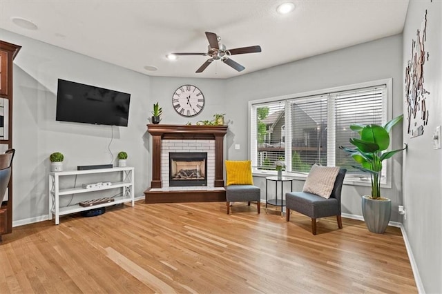 12544 Grand Ct, Kansas City, MO 64145 - sitting room with recessed lighting, light wood-style floors, baseboards, and ceiling fan