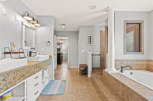 12544 Grand Ct, Kansas City, MO 64145 - bathroom with a bath, visible vents, tile patterned floors, and vanity