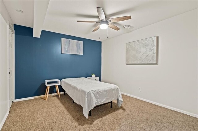 12544 Grand Ct, Kansas City, MO 64145 - bedroom featuring carpet flooring, baseboards, and ceiling fan