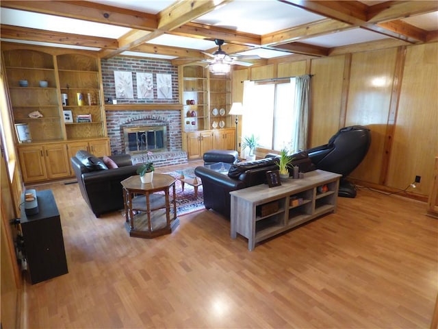 2405 W 123rd Ter, Leawood, KS 66209 - living area featuring light wood-type flooring, built in features, wood walls, and ceiling fan
