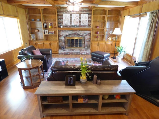2405 W 123rd Ter, Leawood, KS 66209 - living area featuring plenty of natural light, built in features, and wood finished floors