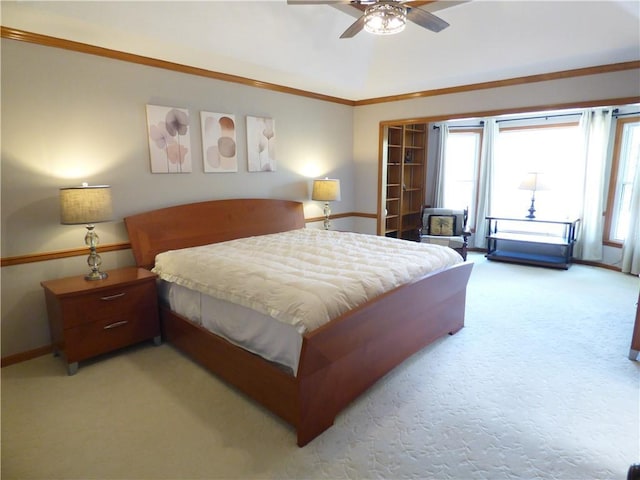 2405 W 123rd Ter, Leawood, KS 66209 - bedroom with light colored carpet, ceiling fan, baseboards, and ornamental molding