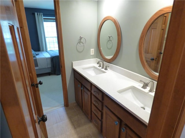 2405 W 123rd Ter, Leawood, KS 66209 - bathroom featuring tile patterned flooring, a sink, and double vanity