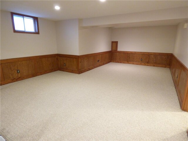 2405 W 123rd Ter, Leawood, KS 66209 - below grade area featuring light carpet, a wainscoted wall, and recessed lighting