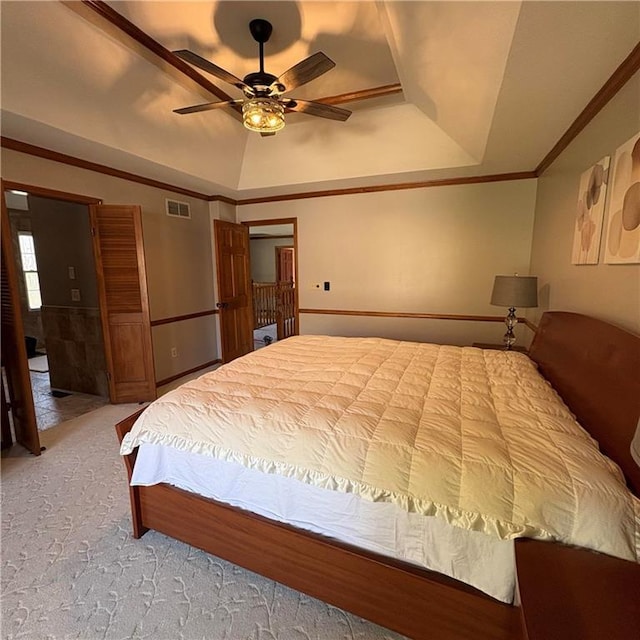 2405 W 123rd Ter, Leawood, KS 66209 - bedroom featuring light carpet, a tray ceiling, visible vents, ceiling fan, and crown molding