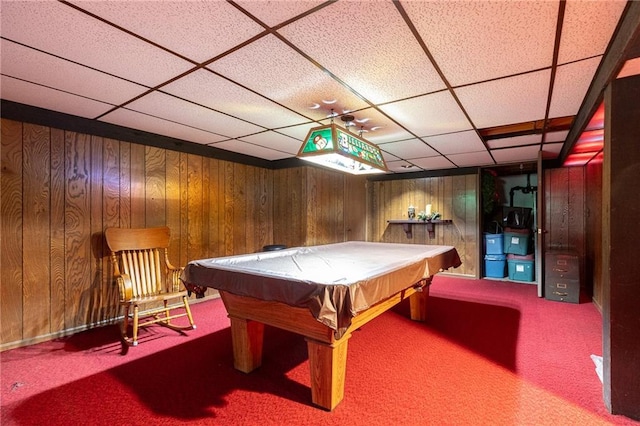 rec room featuring carpet flooring, a paneled ceiling, pool table, and wooden walls