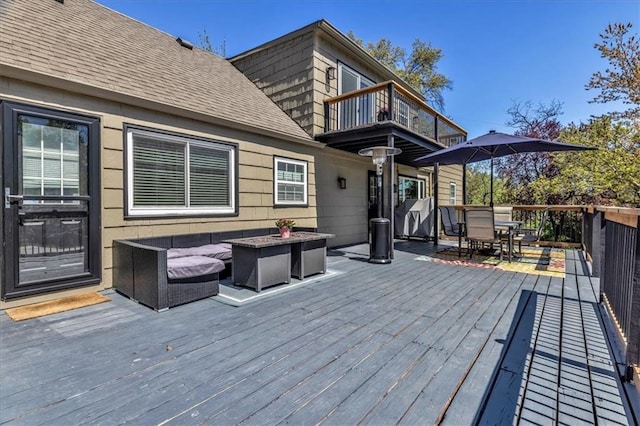 9501 Wornall Rd, Kansas City, MO 64114 - wooden terrace featuring an outdoor living space with a fire pit and outdoor dining area