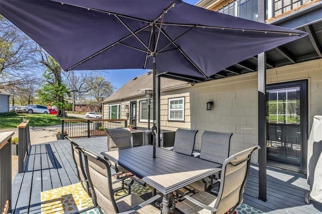 9501 Wornall Rd, Kansas City, MO 64114 - wooden deck featuring outdoor dining area