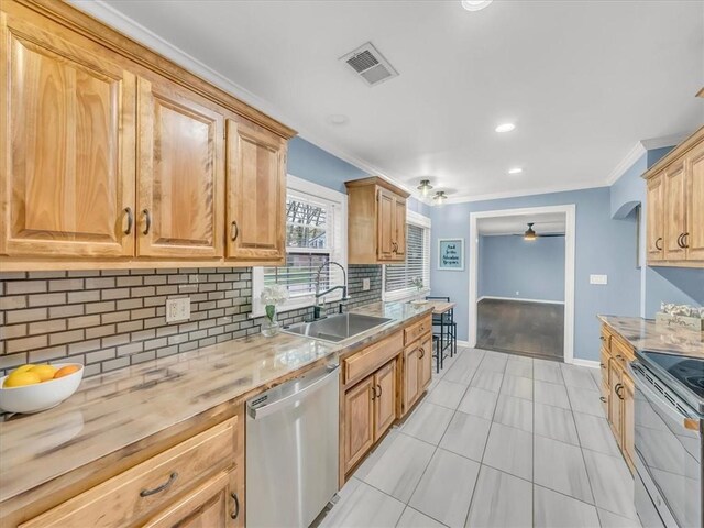 9501 Wornall Rd, Kansas City, MO 64114 - kitchen featuring tasteful backsplash, a sink, ceiling fan, stainless steel appliances, and ornamental molding