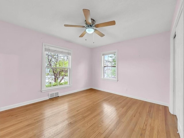 9501 Wornall Rd, Kansas City, MO 64114 - unfurnished bedroom featuring baseboards, a closet, visible vents, and light wood-style flooring