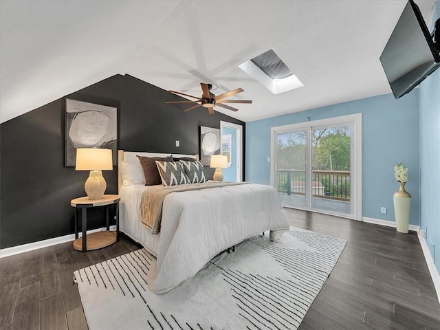 9501 Wornall Rd, Kansas City, MO 64114 - bedroom with a ceiling fan, wood finished floors, lofted ceiling with skylight, baseboards, and access to outside