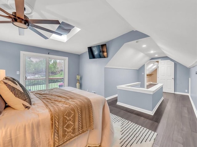 9501 Wornall Rd, Kansas City, MO 64114 - bedroom with recessed lighting, lofted ceiling with skylight, dark wood-style floors, and access to outside